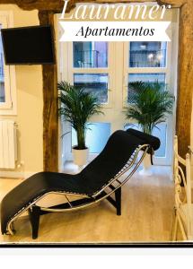 TV a/nebo společenská místnost v ubytování Lauramer Apartamento Bilbao