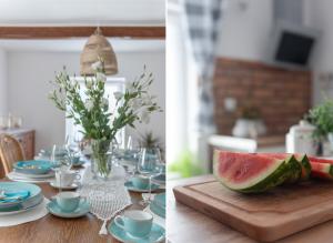 a table with a slice of watermelon on a cutting board at PATYKIEM PO WODZIE in Jastarnia