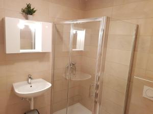 Koupelna v ubytování Apartments Huljić + 37 fotografií