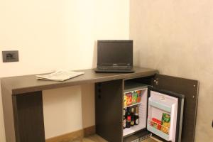TV a/nebo společenská místnost v ubytování House Beatrice Milano
