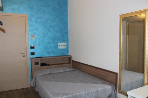 Postel nebo postele na pokoji v ubytování House Beatrice Milano