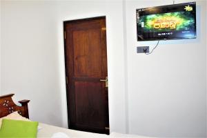 TV a/nebo společenská místnost v ubytování Sky White Villa