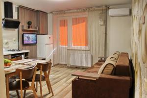 TV a/nebo společenská místnost v ubytování Molex Apartments 3