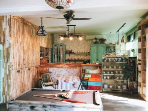 a kitchen with a pool table in a room at Jarasum Guest House in Gapyeong +50 photos