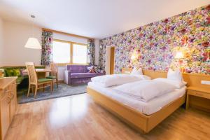 Posteľ alebo postele v izbe v ubytovaní Haus Braunarl