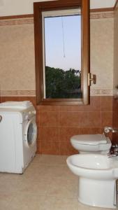 Kúpeľňa v ubytovaní Villa PARADISE BIFAMILIARE San vito lo capo