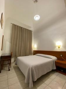 Postel nebo postele na pokoji v ubytování Hotel Il Papavero + 12 fotografií