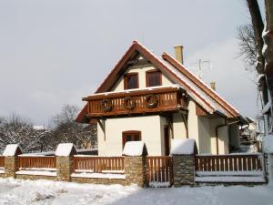 
Apartmánový dom Slniečko v zimě
