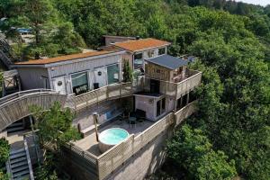 an aerial view of a house with a swimming pool at Treetop Spa Hangout & Hotel in Gothenburg