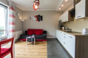 Kuchyň nebo kuchyňský kout v ubytování Apartamenty Izerskie