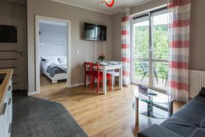 TV a/nebo společenská místnost v ubytování Apartamenty Izerskie