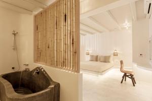 Posteľ alebo postele v izbe v ubytovaní Naxian Collection - Small Luxury Hotel of the World