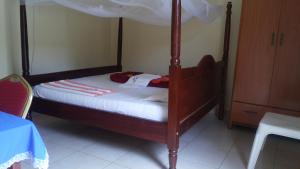 Ένα ή περισσότερα κρεβάτια σε δωμάτιο στο Leam Guesthouse