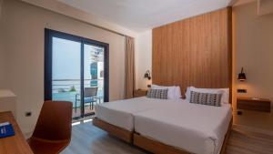 A bed or beds in a room at Isla Mallorca & Spa