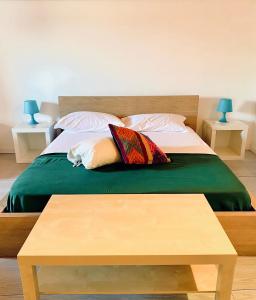 Posteľ alebo postele v izbe v ubytovaní U Palazzieddu Rooms