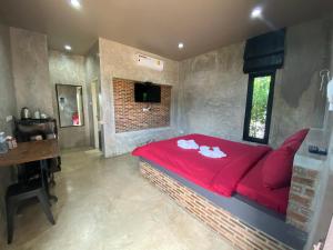 The Loft House Sakaeo的电视和/或娱乐中心