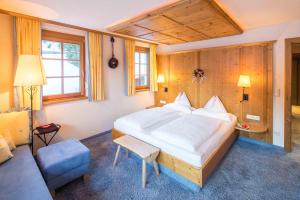 Ένα ή περισσότερα κρεβάτια σε δωμάτιο στο Hotel Ilga