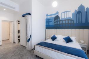 Posteľ alebo postele v izbe v ubytovaní Frattina FF italian suites