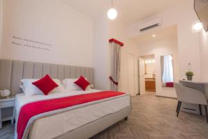 Posteľ alebo postele v izbe v ubytovaní Frattina FF italian suites