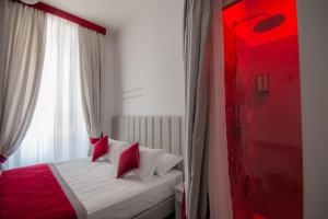 Posteľ alebo postele v izbe v ubytovaní Frattina FF italian suites