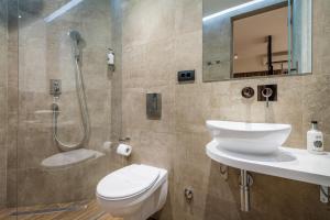 Koupelna v ubytování Level Luxury Suites