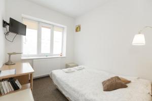 Postel nebo postele na pokoji v ubytování Happy Inn