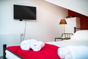 Łóżko lub łóżka w pokoju w obiekcie Apartment Zamojska 8 - Apartamenty GKM Lublin