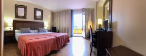 Postel nebo postele na pokoji v ubytování HOTEL V.CIUDAD