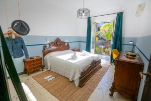 Una cama o camas en una habitación de Villa Caterina - Solemar Sicilia