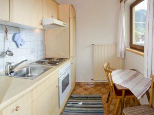 A cozinha ou cozinha compacta de Ferienwohnung mit Wlan & Balkon A 394.010