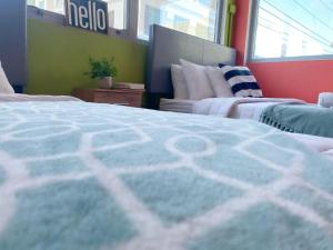 Letto o letti in una camera di Conturce Hostel