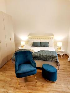 Katil atau katil-katil dalam bilik di Ca' Benedetta ApartSuite House