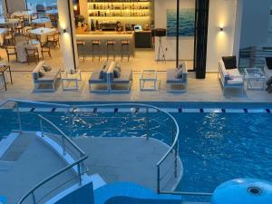 Bazén v ubytování Olympia Hotel nebo v jeho okolí