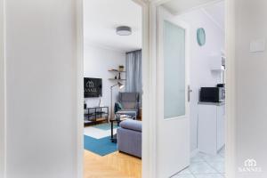Televízia a/alebo spoločenská miestnosť v ubytovaní Apartament Gryf w sercu Szczecina-SANNEL Apartments for rent