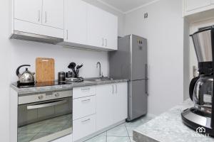 Kuchyňa alebo kuchynka v ubytovaní Apartament Gryf w sercu Szczecina-SANNEL Apartments for rent