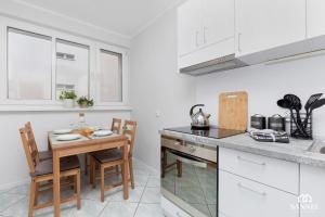 Kuchyňa alebo kuchynka v ubytovaní Apartament Gryf w sercu Szczecina-SANNEL Apartments for rent