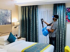 Postel nebo postele na pokoji v ubytování Touq Al Balad Hotel - فندق توق البلد