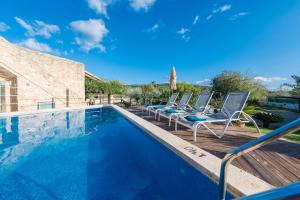 The swimming pool at or close to Villa Can Pau, pool and garden close to the beach