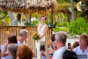 a bride walking down the aisle at a wedding at Portofino Beach Resort-An Authentic Island Escape! in San Pedro