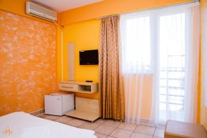 TV a/nebo společenská místnost v ubytování Meridian Costinești