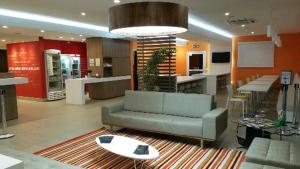 The lobby or reception area at Partner Caxias do Sul
