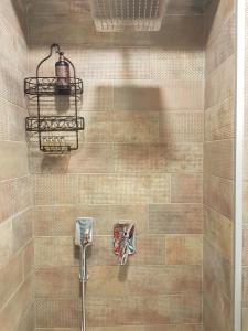 Et badeværelse på Alfa Luxury Boutique