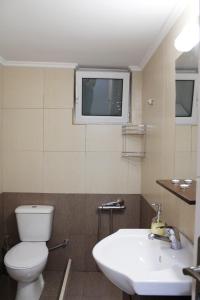 Koupelna v ubytování Bilines Home