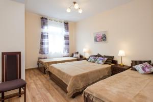 Postel nebo postele na pokoji v ubytování Vanilla 5 Apartment