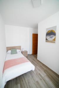 Postel nebo postele na pokoji v ubytování El Rincón del Sol