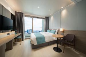 Ein Bett oder Betten in einem Zimmer der Unterkunft Utop Boutique Hotel&Residence