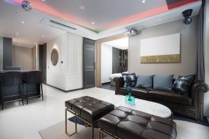 Ein Sitzbereich in der Unterkunft Utop Boutique Hotel&Residence