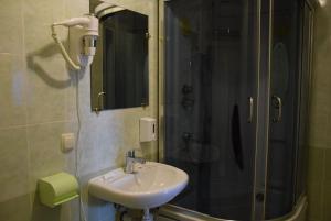 Koupelna v ubytování Voskhod Hotel