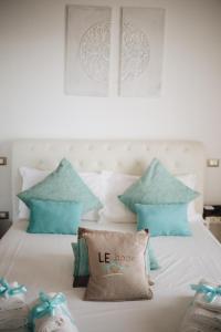Postel nebo postele na pokoji v ubytování Le Home B&B