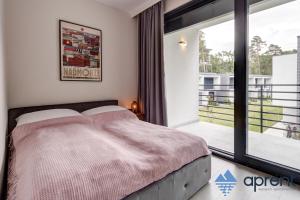 Posteľ alebo postele v izbe v ubytovaní Domek Jerza - Aprent + 22 fotografií